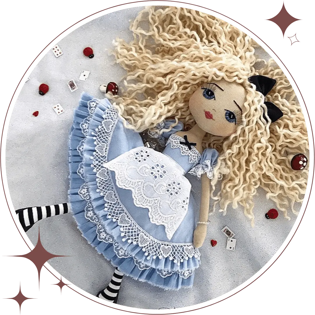 Handmade Alice in Wonderland doll photographed to look like she is falling down the rabbit hole. She is wearing a blue dress with white apron and black stripe stockings.