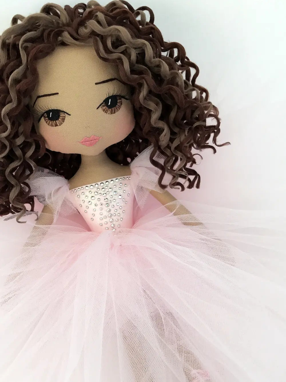 Ballerina keepsake doll with pink tutu and diamante detail. Doll has hand embroidered face with brown eyes, pink lips and eyelashes