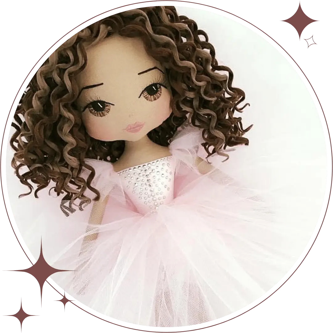 handmade ballerina doll wearing a pink tutu with silver diamante detail; featuring long brown curly hair, brown hand embroidered eyes