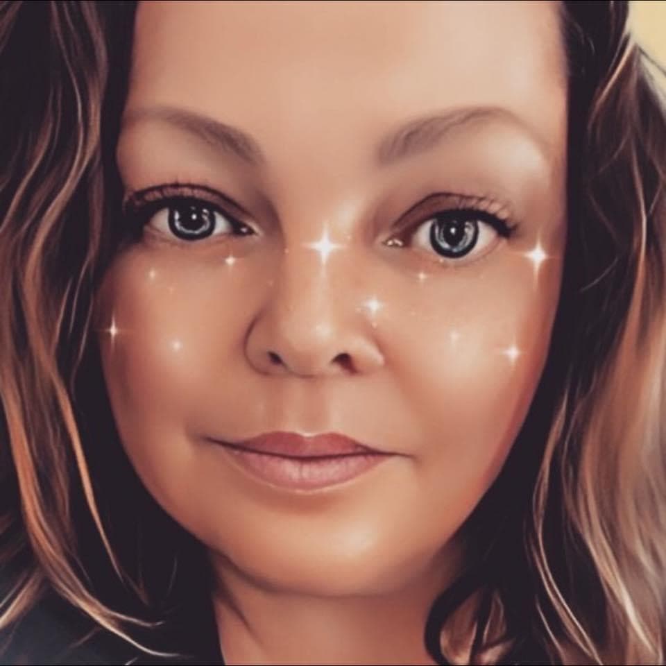close up cartoonish image of doll maker with sparkles on her face, long brown hair and blue eyes