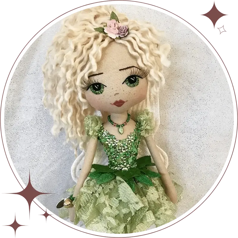 green tinker fairy wearing a green lace pettiskirt, green glitter leaves and green diamante and sequin bodice with sparkly white fairy wings