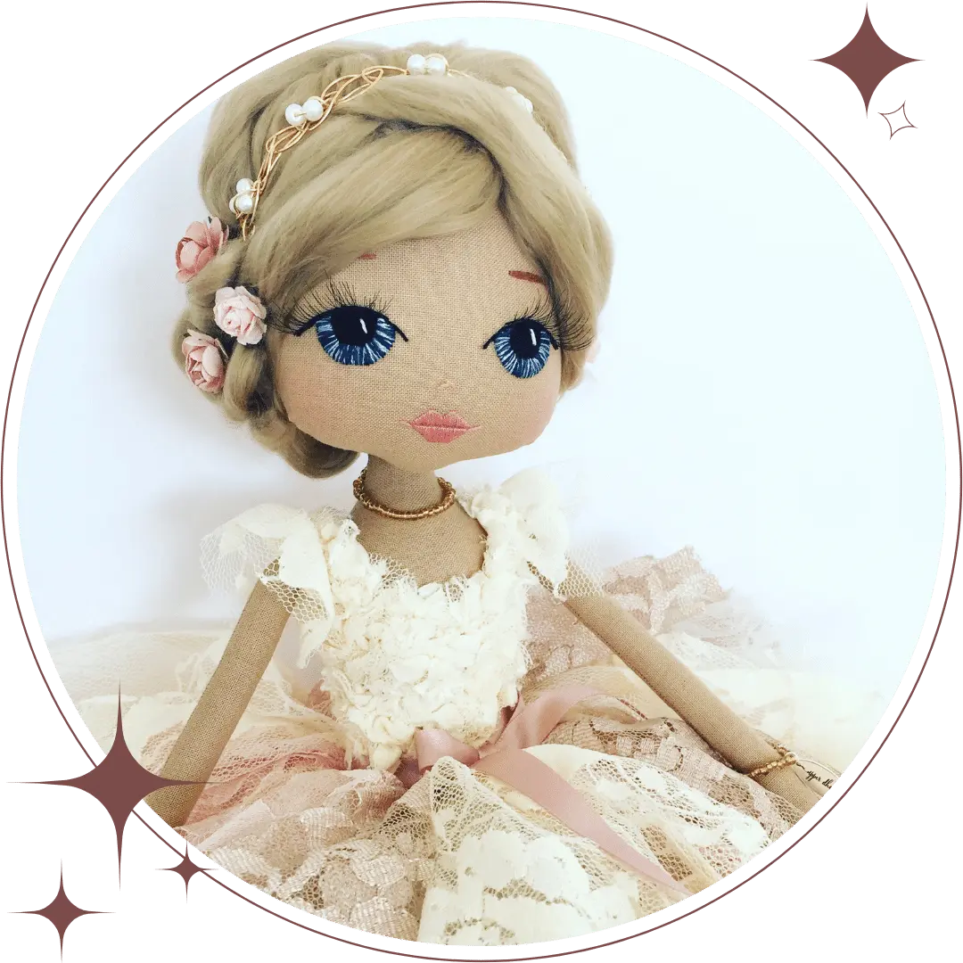 dreamy handmade doll with short dark blonde hair featuring a golden headband with pearls and pink roses, blue eyes, creamy ivory and brown lace dress with pink detail