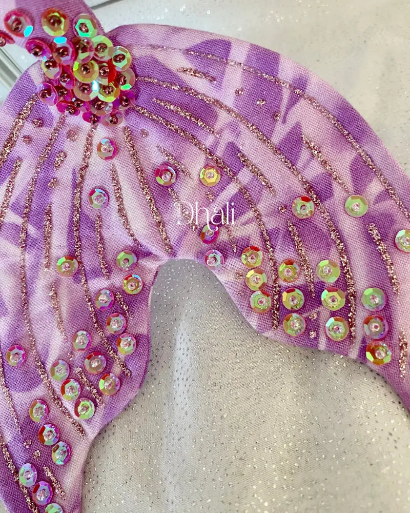Handmade mermaid doll tail in purple with fuchsia pink sequin and glitter detail.