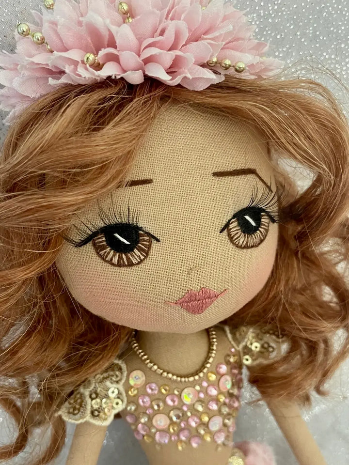 Pink & Gold handmade mermaid doll with auburn curly hair and hand embroidered brown eyes