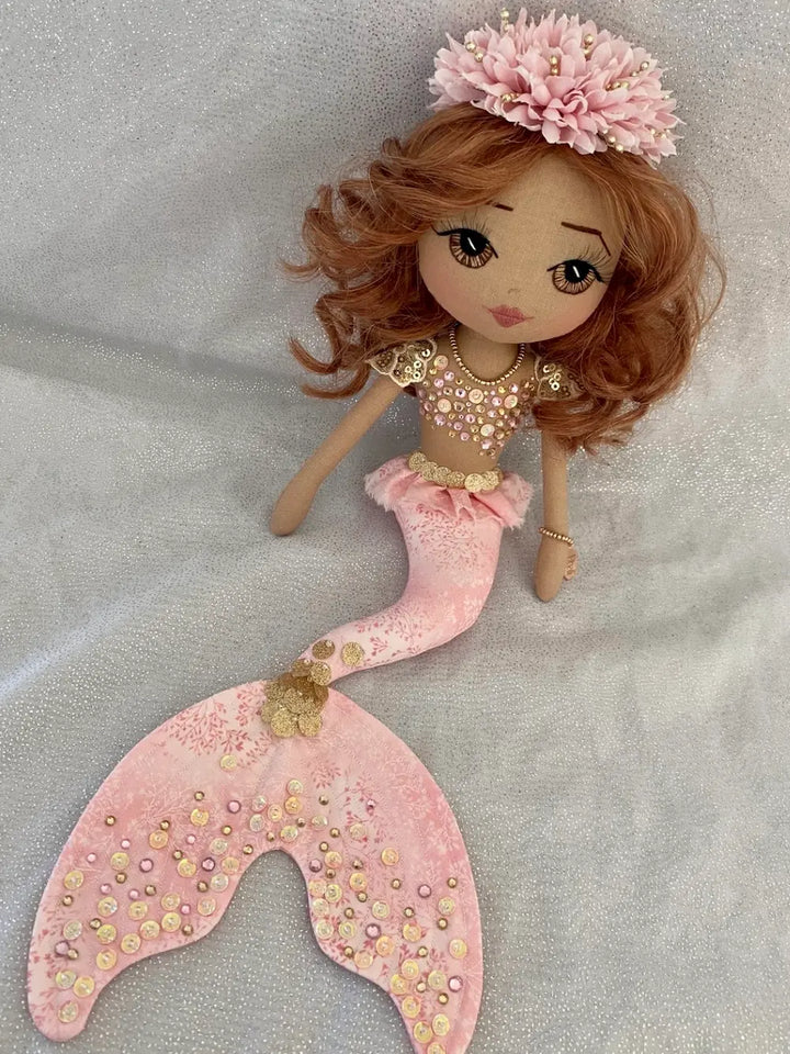 Pink & Gold handmade mermaid doll with auburn curly hair and hand embroidered brown eyes