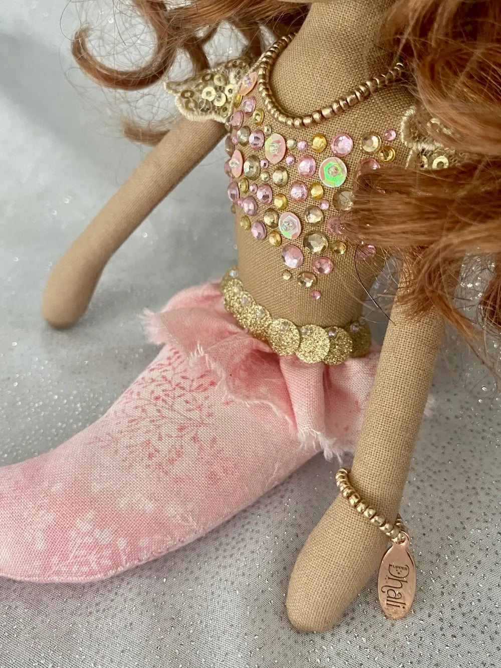 Pink & Gold handmade mermaid doll with auburn curly hair and hand embroidered brown eyes