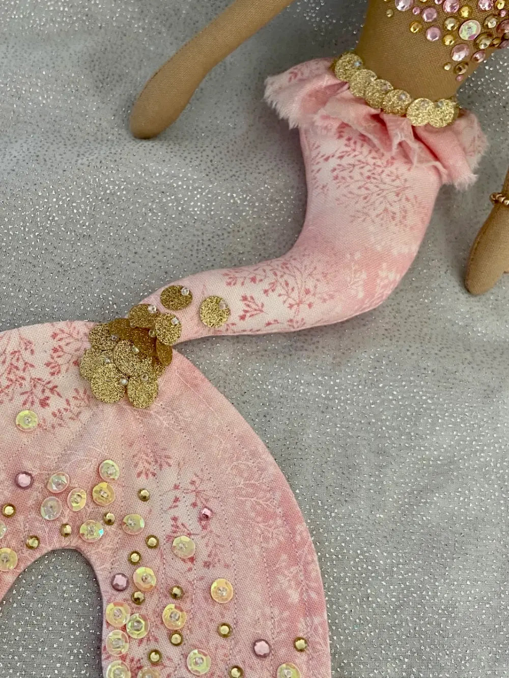 Pink & Gold handmade mermaid doll with auburn curly hair and hand embroidered brown eyes