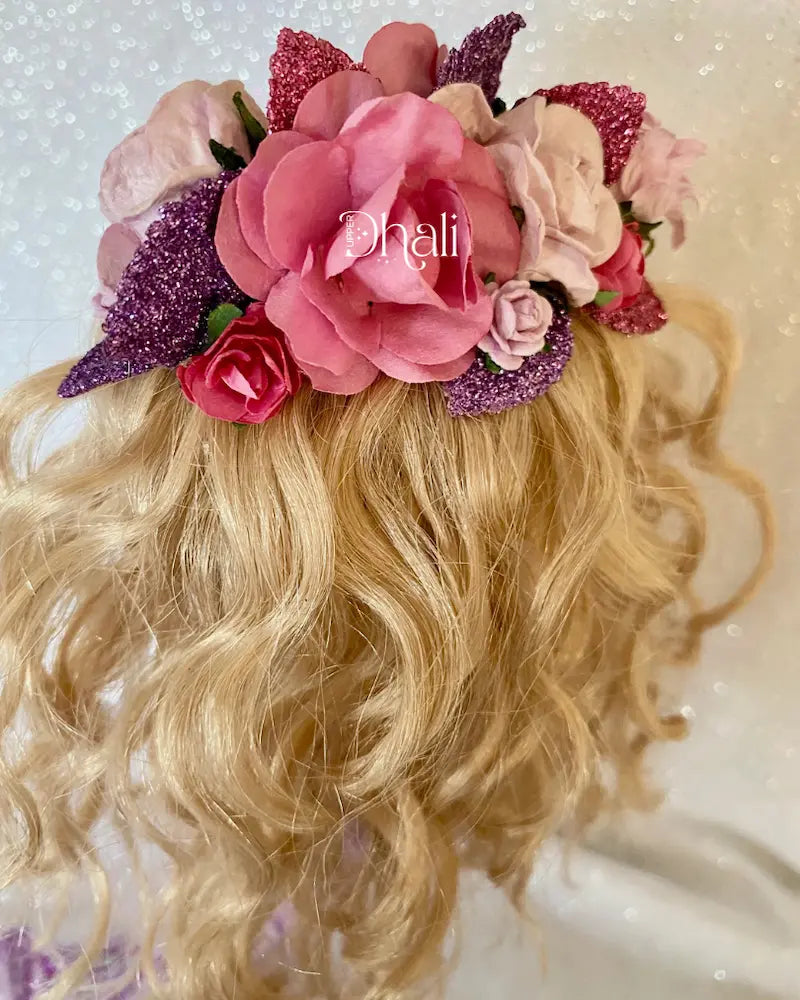 Handmade mermaid doll with purple tail and fuchsia pink sequin and bead detail. Featuring a flower mermaid crown with glitter leaves, hand embroidered face featuring green eyes