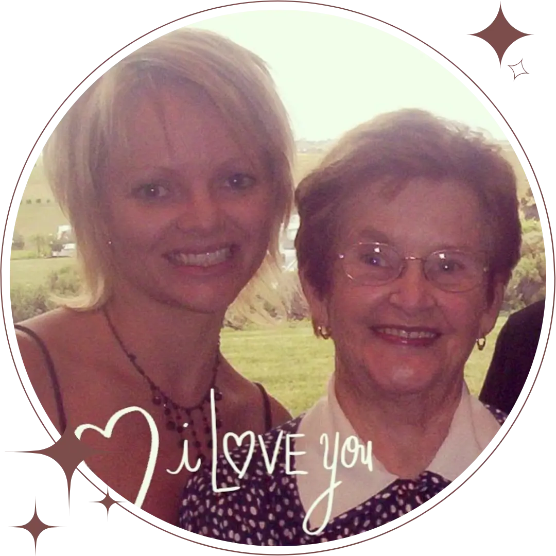 Two ladies smiling at the camera, grandmother & granddaughter