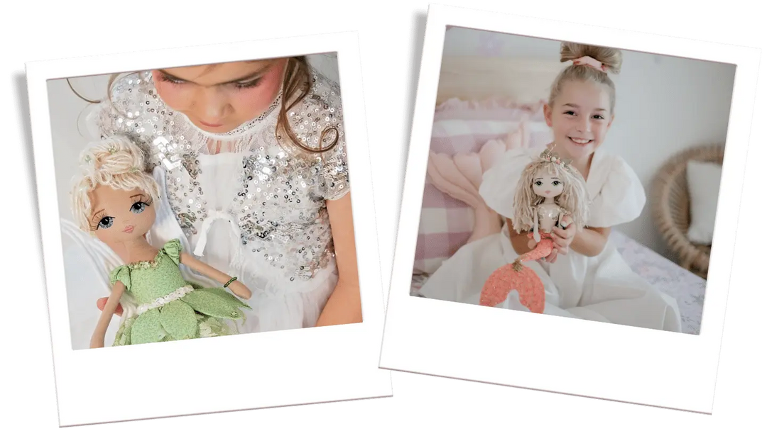 green Tinkerbell fairy doll and coral and gold mermaid being held by their new happy owners