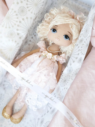 Handmade doll with blonde hair, blue eyes and a shabby chic pink and white lace dress with gold glitter shoes