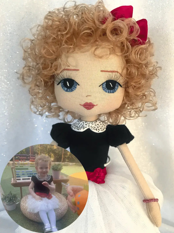Upper Dhali handmade doll personalised mini-me keepsake. Hand embroidered blue eyes, strawberry blonde curls, wearing a black top and white tutu skirt