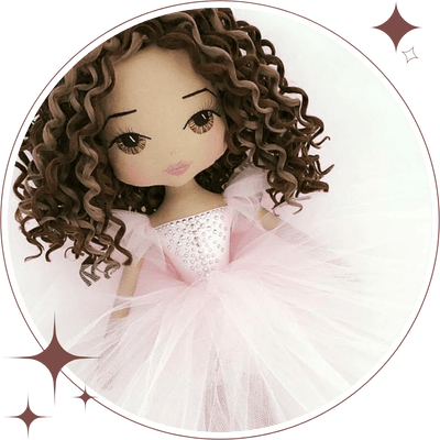 Upper Dhali handmade ballerina doll wearing a pink tutu with diamante sparkle bodice. Curly two tone brown hair and an embroidered face with brown eyes