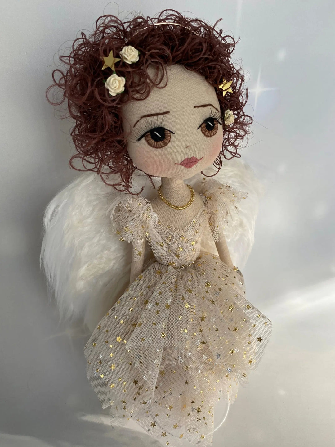 Golden angel doll with brown curls and mohair felted wings made by Upper Dhali