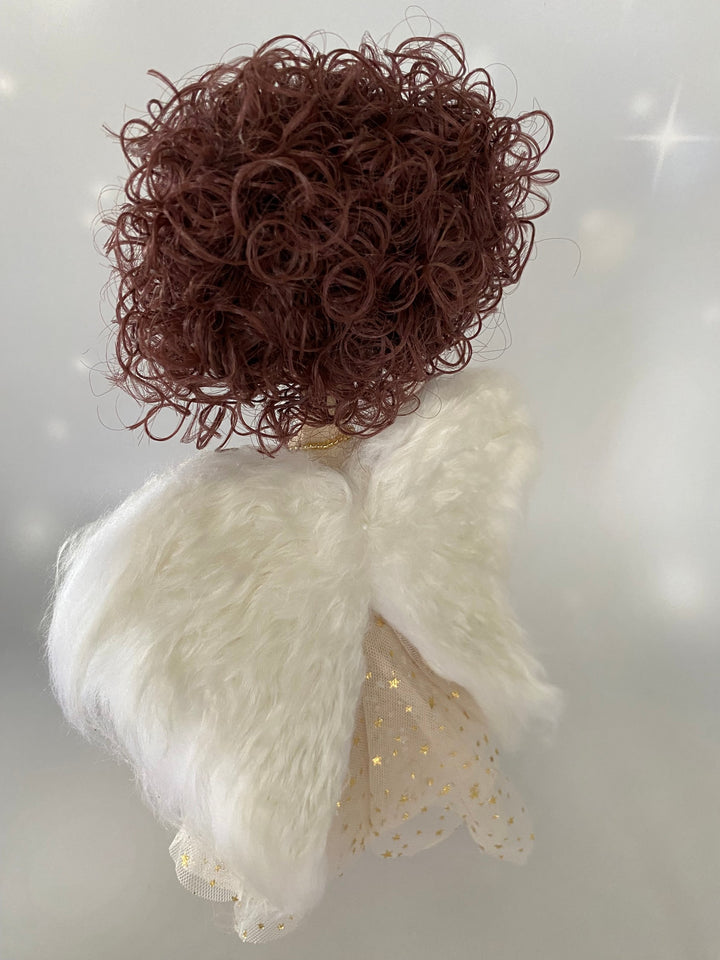 Back view of Christmas Angel keepsake doll featuring eri (peace) silk and mohair hand felted angel wings.