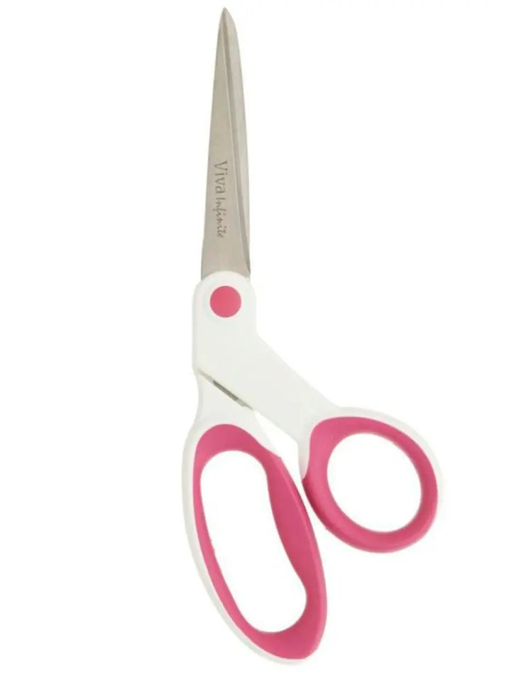 Scissors with pink handles on a white background