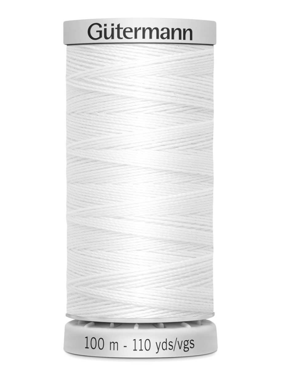 Spool of white Gutermann thread 100m on a white background