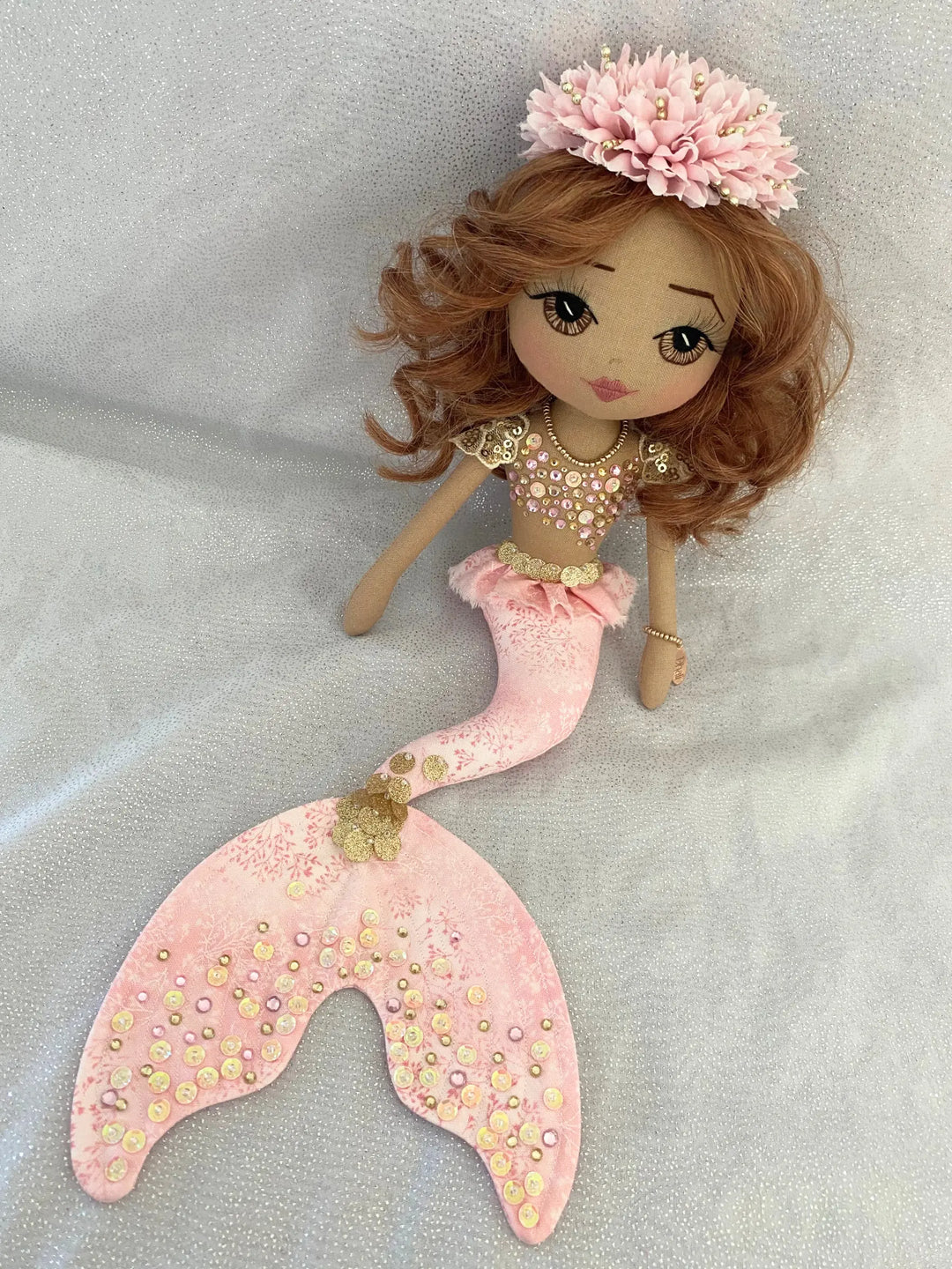 Asherah Rose Mermaid doll in light pink and gold with auburn hair. Made by Upper Dhali