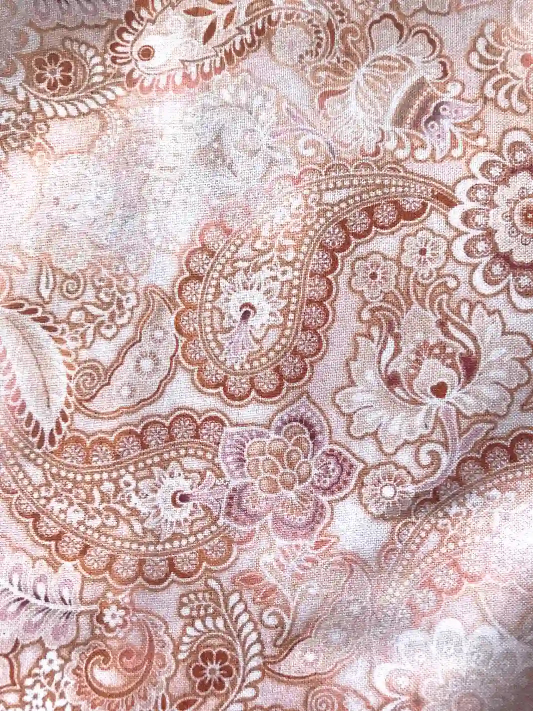 handmade mermaid doll tail print in neutral boho tones of brown, peach, pink and violet paisley print