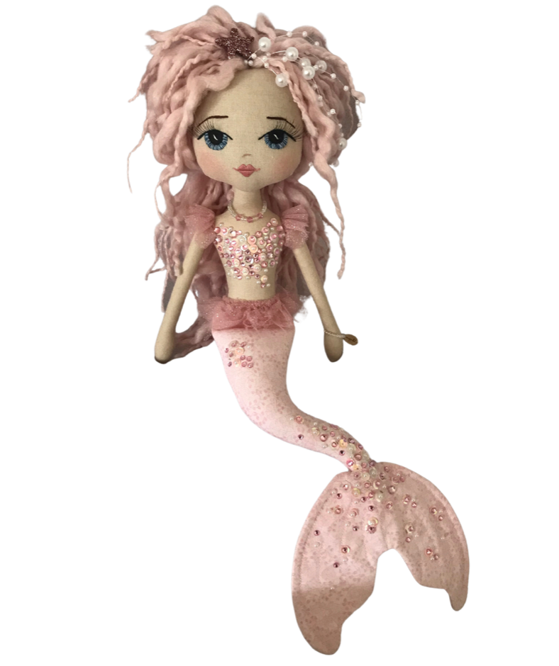 pink handmade mermaid doll with blue eyes and long pink dreadlocks for hair. Featuring a diamante and sequin mermaid top and sparkly mermaid tail