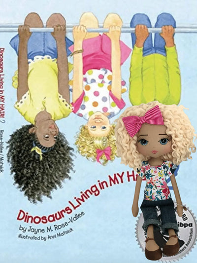 Dinosaurs Living in my Hair children's book and the handmade doll made for the author to look like the main character