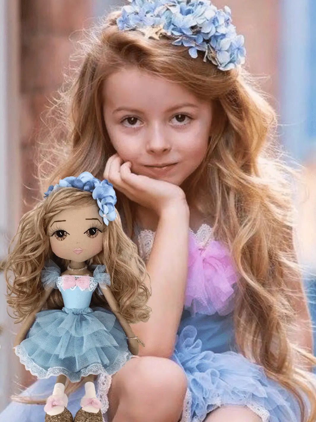 young girl wearing a blue dollcake vintage tutu dress with her Upper Dhali personalised handmade mini-me doll wearing the same outfit